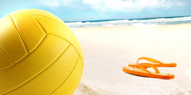 Volleyball in the sand with sandals
